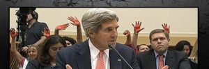 Kerry’e canlı yayında ‘kanlı el’ protestosu