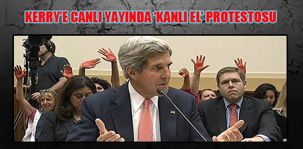 Kerry’e canlı yayında ‘kanlı el’ protestosu
