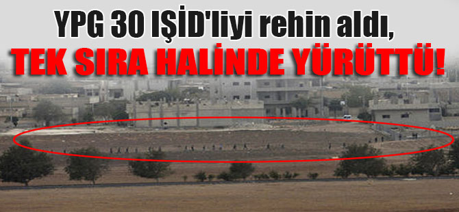 YPG 30 IŞİD’liyi rehin aldı, tek sıra halinde yürüttü!