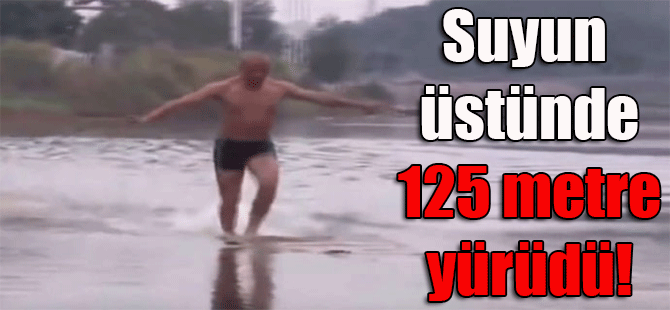 Suyun üstünde 125 metre yürüdü!